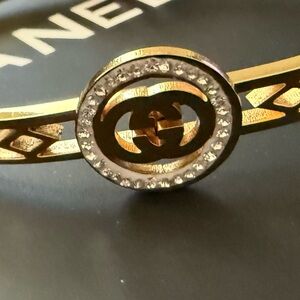 Gold Tone Crystal Accent Logo Bangle Bracelet - Designer Style Gucci